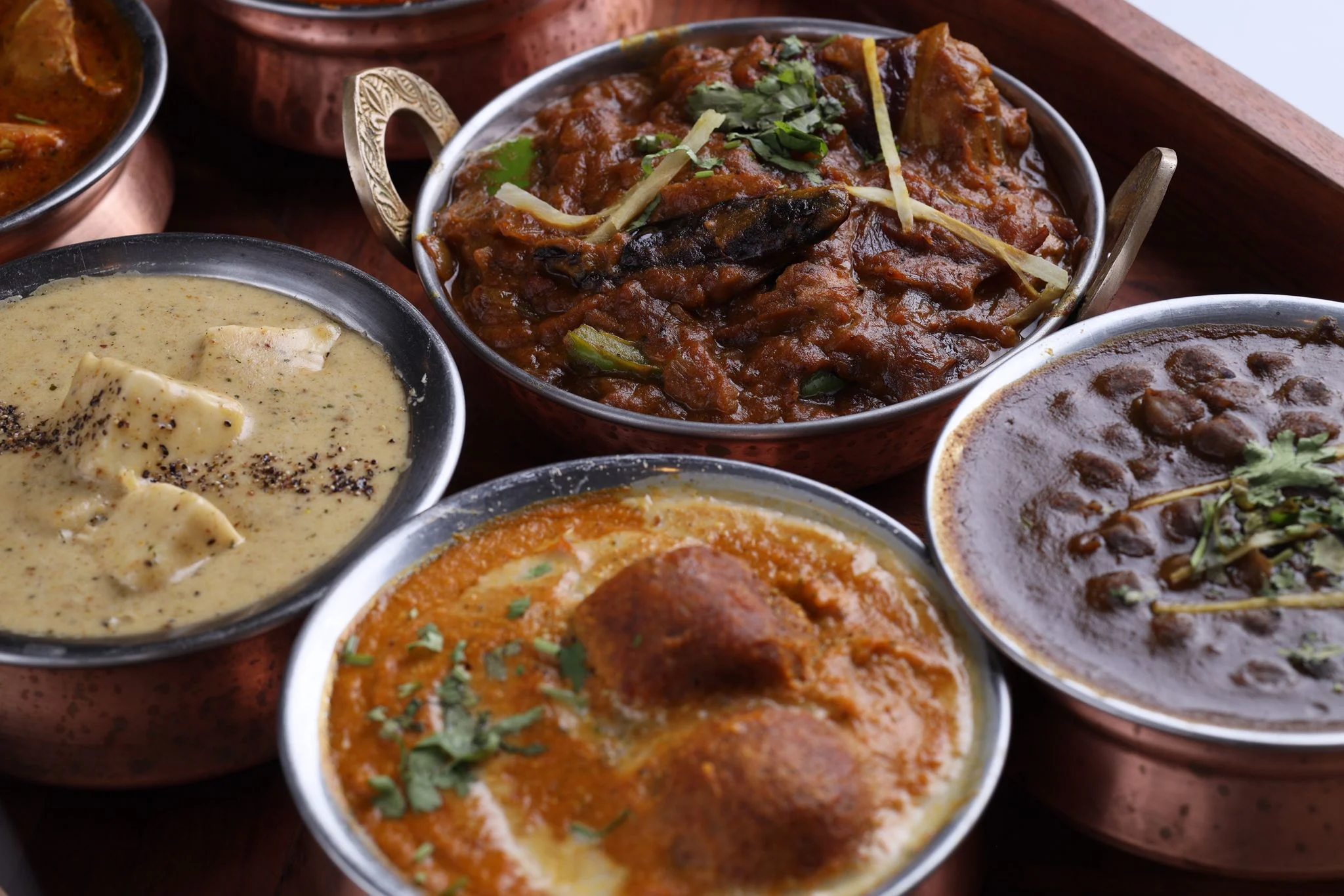 Best Close-up of richly seasoned South Asian curry with aromatic herbs Langley